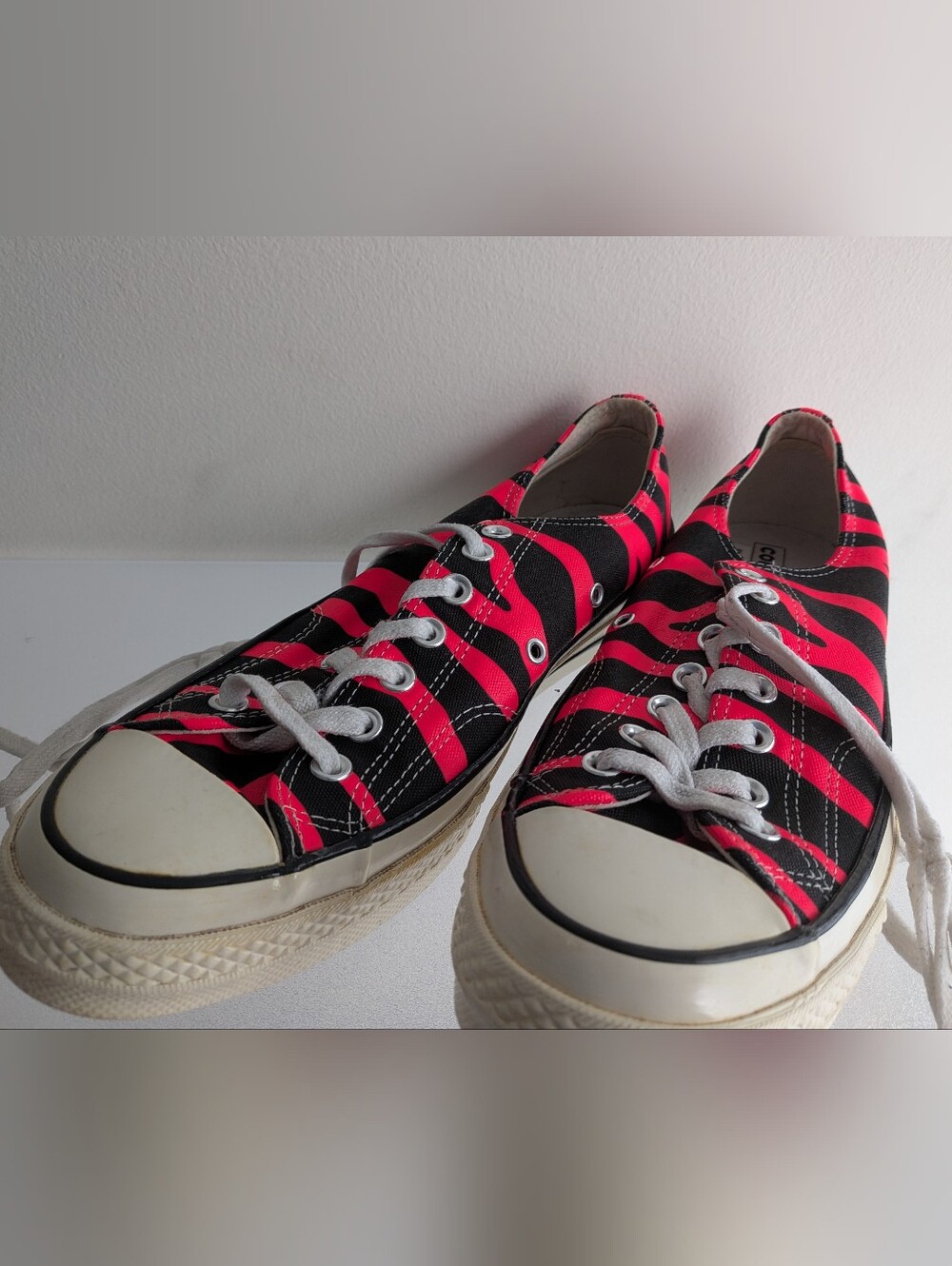 Converse Low-Top Sneakers in Black & Hot Pink Stripe
